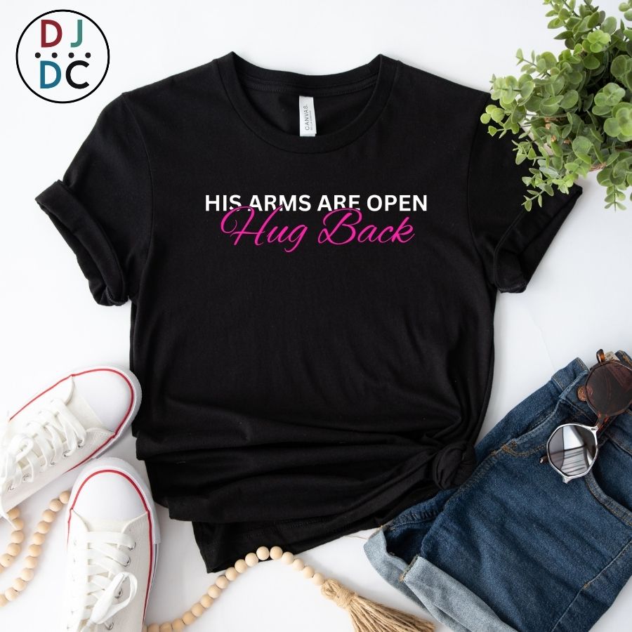 Black t-shirt with "His Arms are Open - Hug Back" text design.