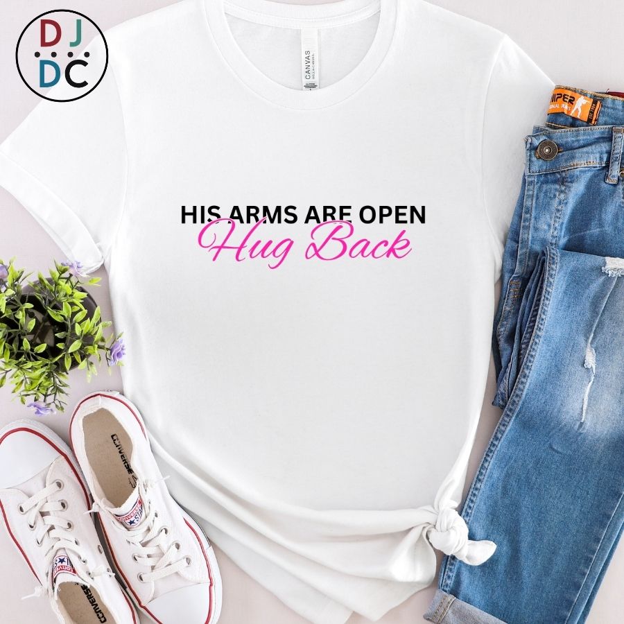 White t-shirt with text, blue jeans, white sneakers, and a plant on a light background