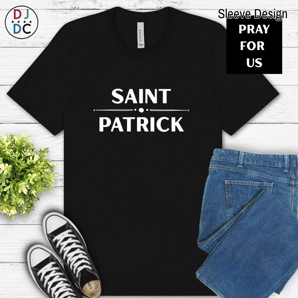 Black t-shirt with 'SAINT PATRICK' text, paired with jeans and sneakers on a light wooden surface.